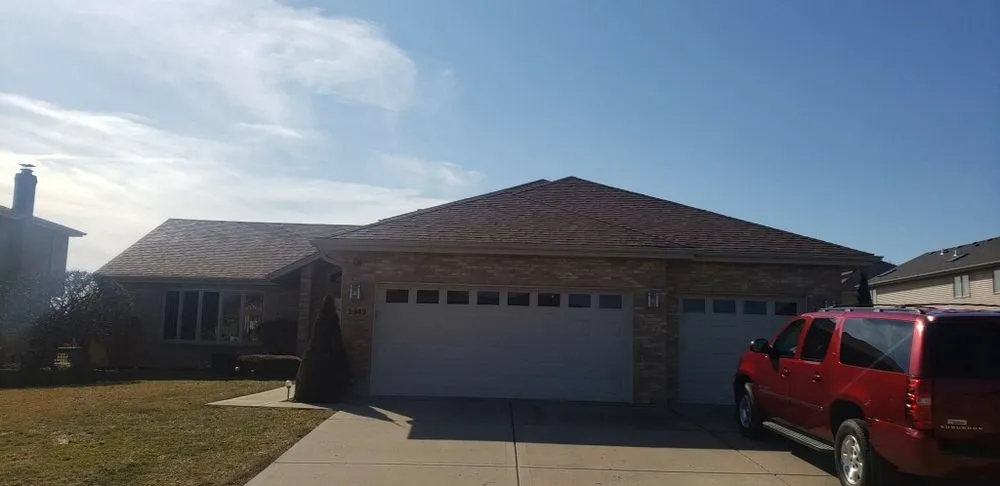 Slide of Iron Guys Roofing and Restoration