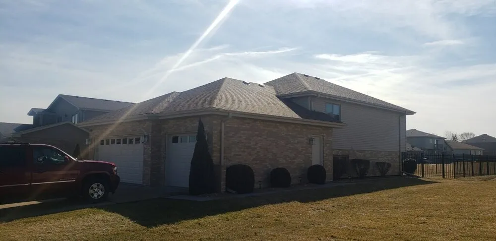 Slide of Iron Guys Roofing and Restoration