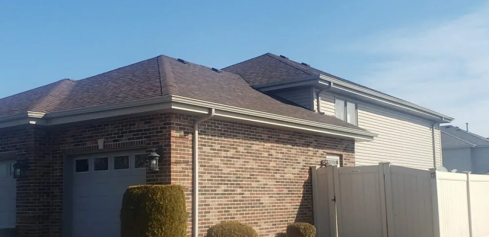 Slide of Iron Guys Roofing and Restoration