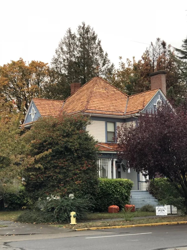 Slide of IronHead Roofing