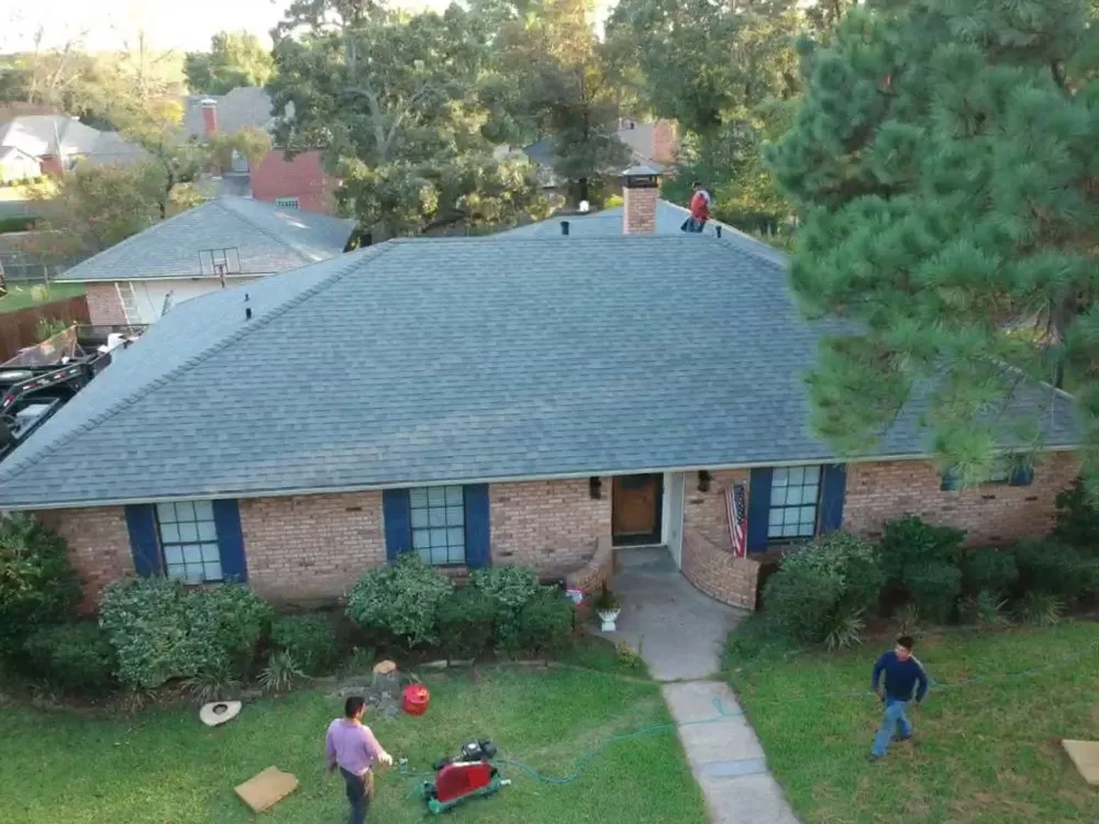 Slide of IronHouse Roofing