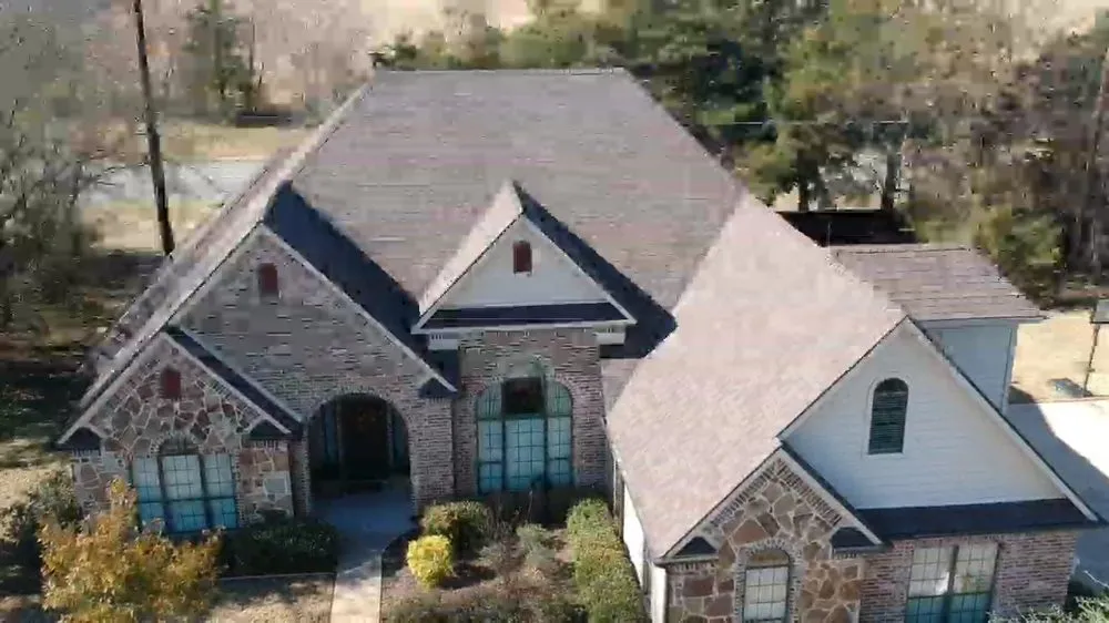 Slide of IronHouse Roofing