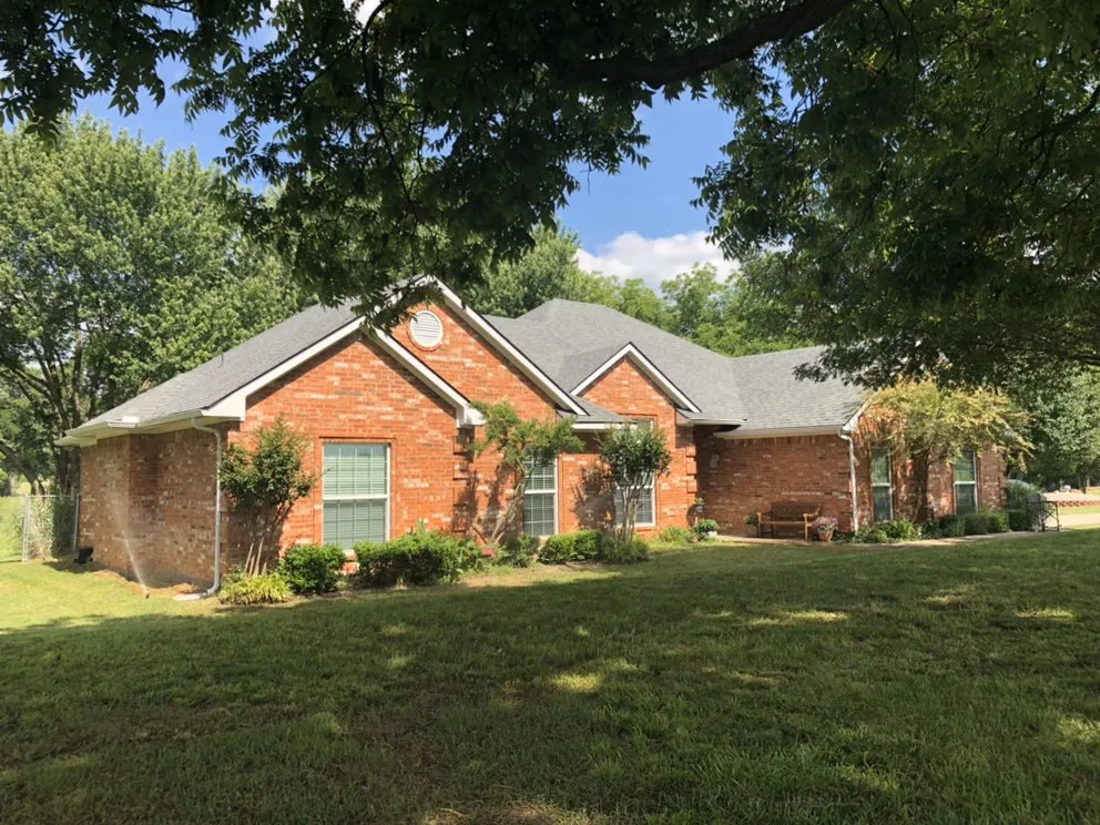 Slide of IronHouse Roofing