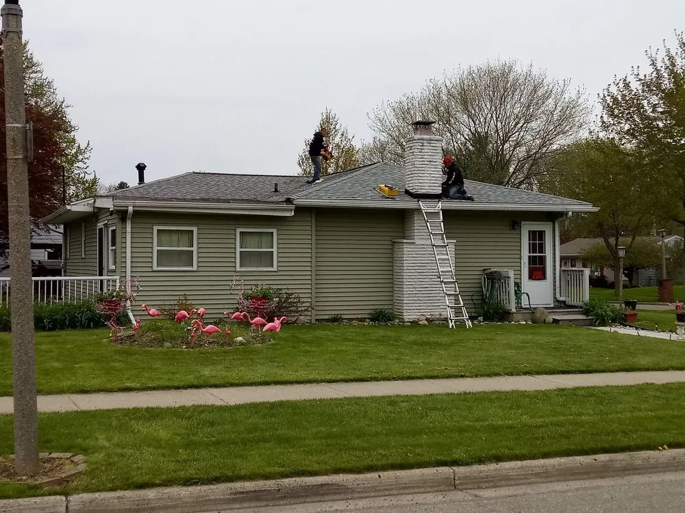 Slide of Isaia's Roofing and Siding