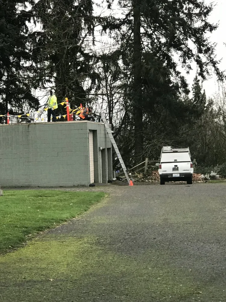 Slide of Island Roofing