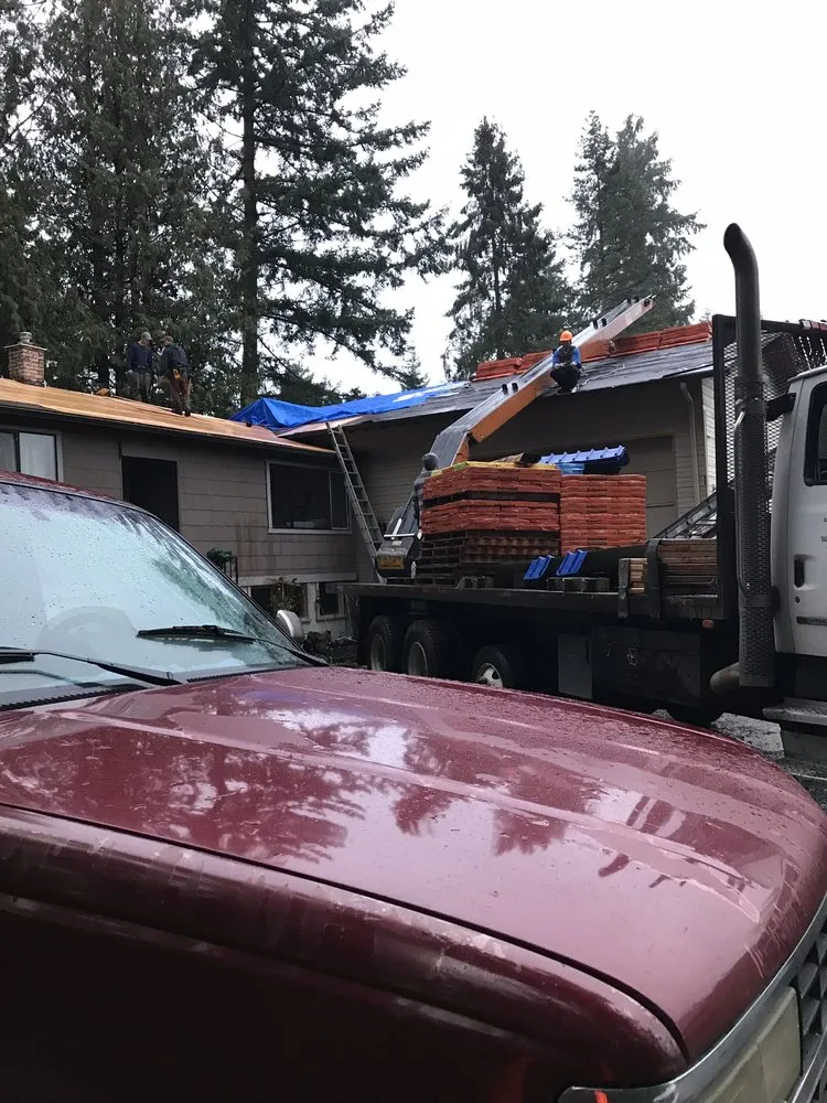 Slide of Island Roofing