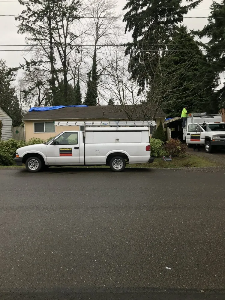 Slide of Island Roofing