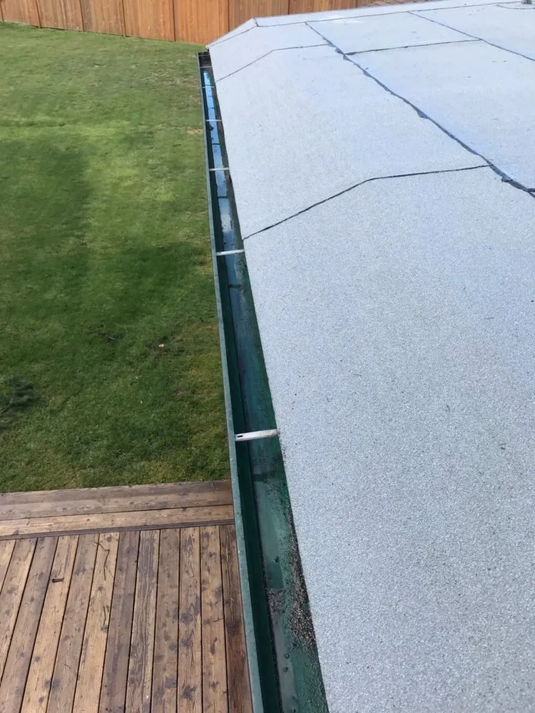 Slide of Island Roofing