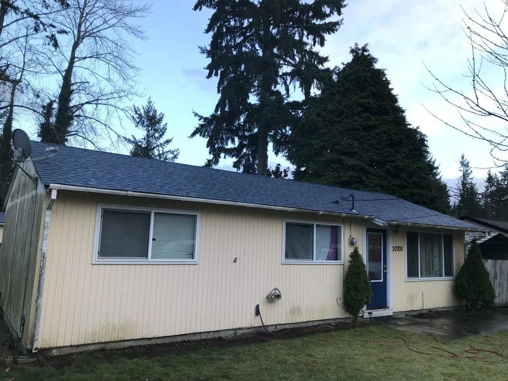 Slide of Island Roofing