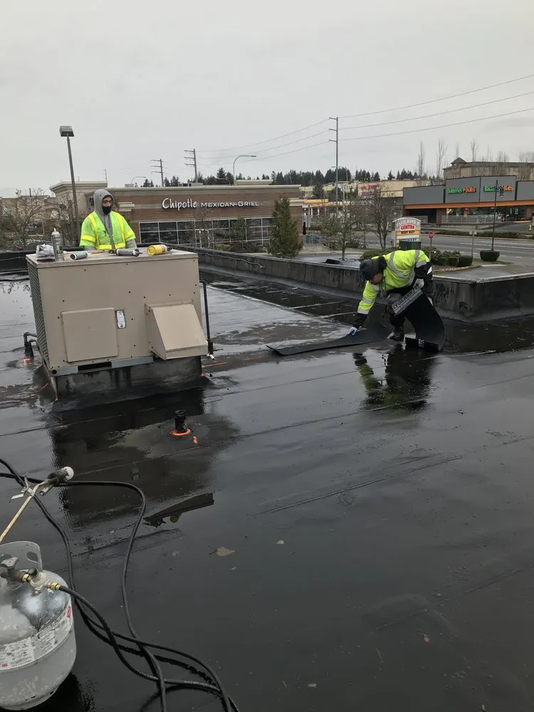 Slide of Island Roofing