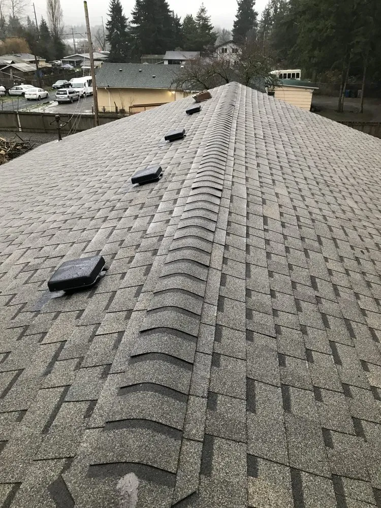 Slide of Island Roofing