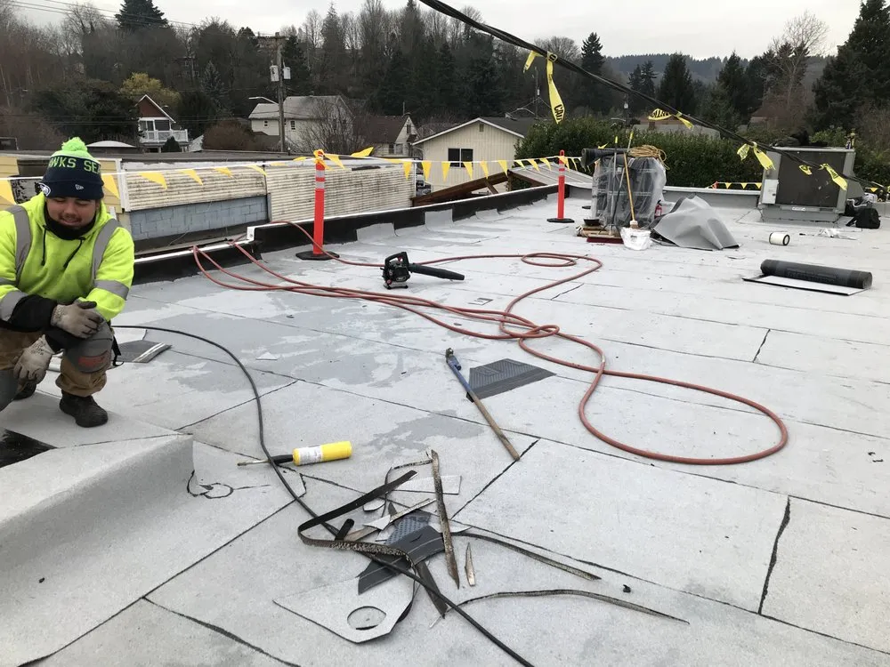 Slide of Island Roofing