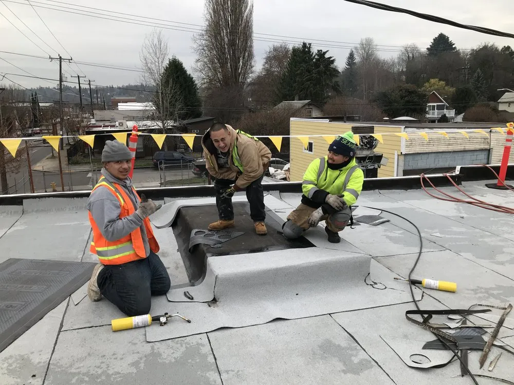 Slide of Island Roofing