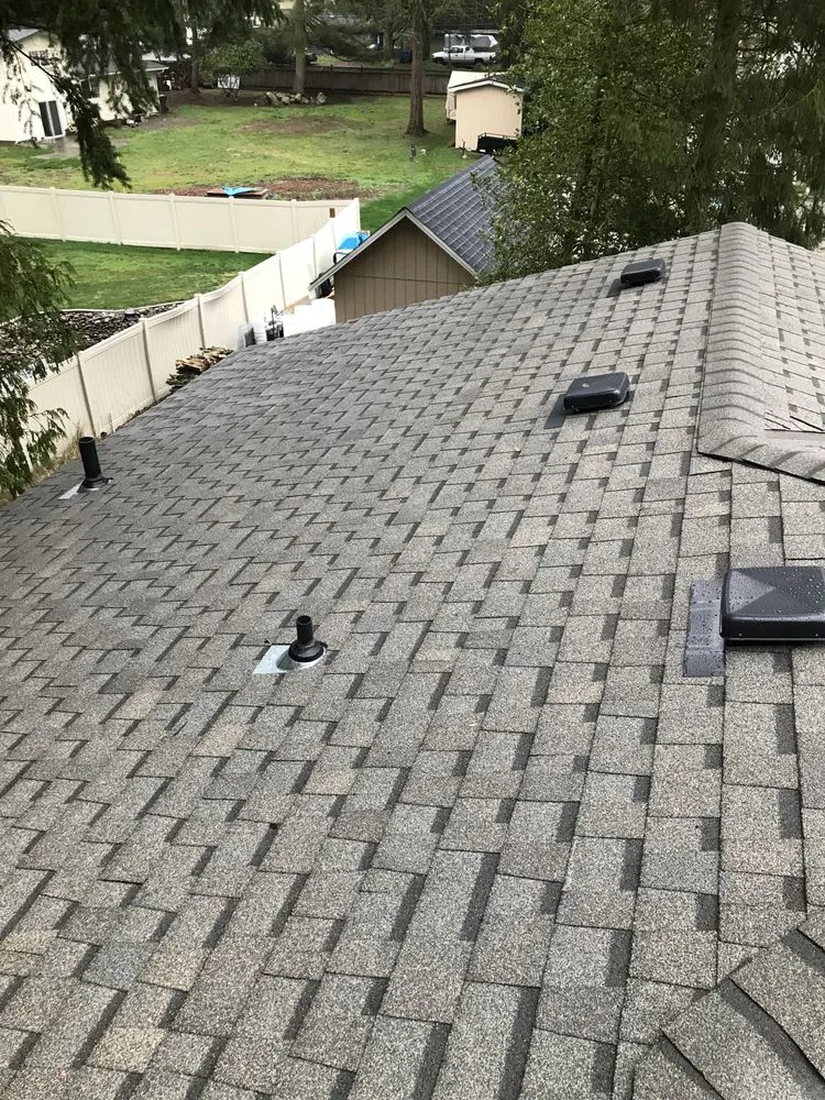 Slide of Island Roofing