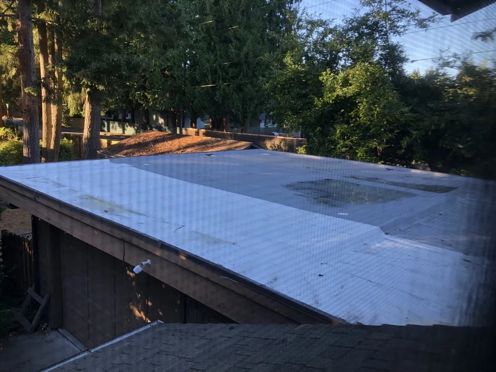 Slide of Islander Roofing