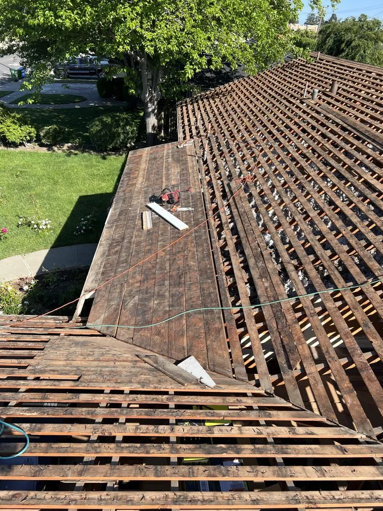 Slide of Israel Professional Roofer