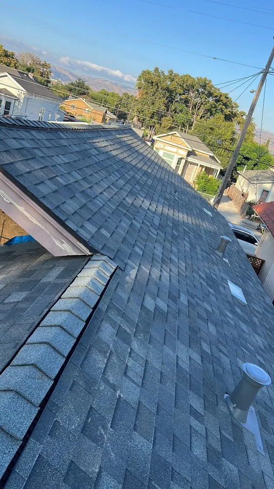 Slide of Israel Professional Roofer