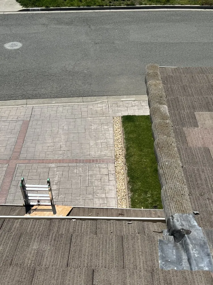 Slide of Israel Professional Roofer