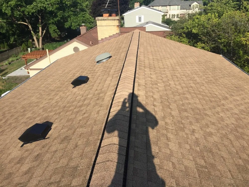 Slide of IToch Roofing