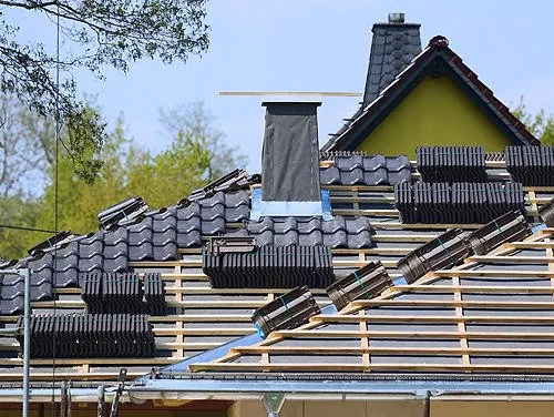 J & B Roofing Construction Logo