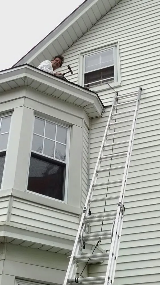 Slide of J & C Roofing