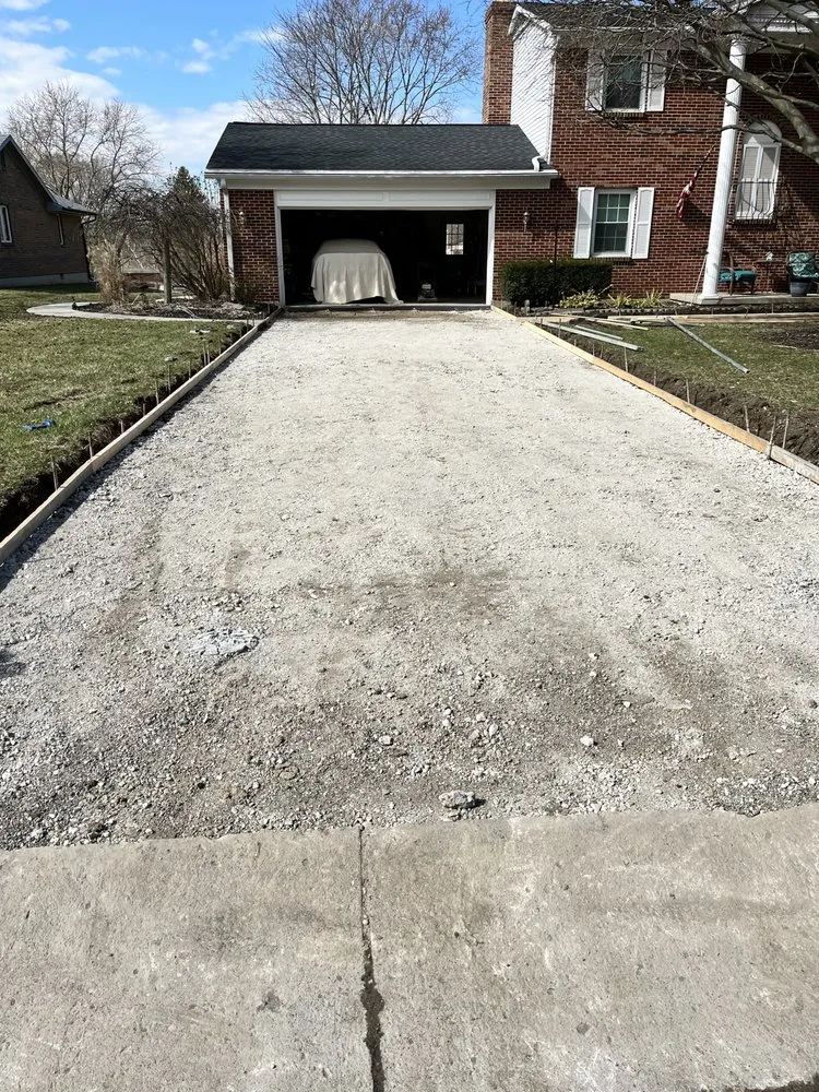 Licensed storm damage roof repair for residential properties in West Elkton, OH by J & J Concrete And Construction