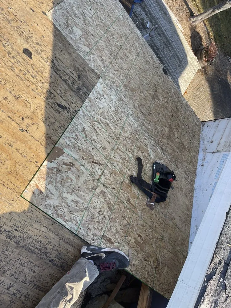 Professional flat roof repair for fast service in Central Lake, MI by J & J Quality Roof Repair And Installation