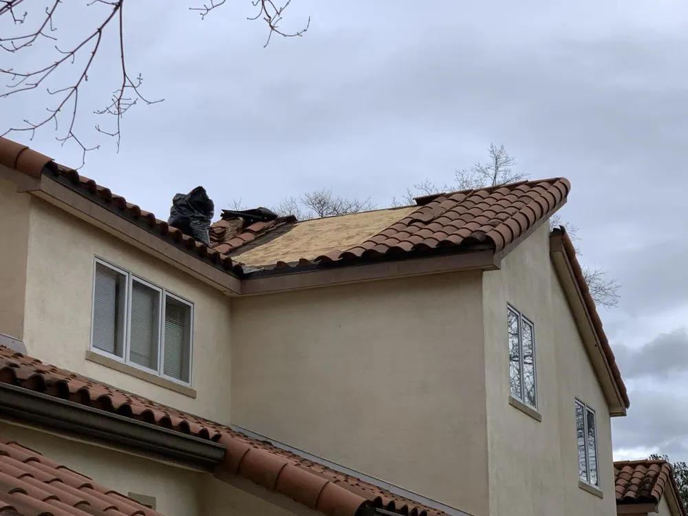 Slide of J & J Roofing