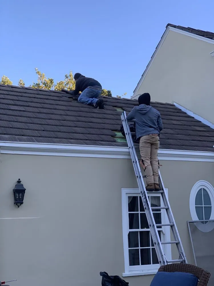 Slide of J & J Roofing