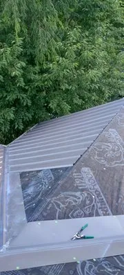 J & M Roofing Logo
