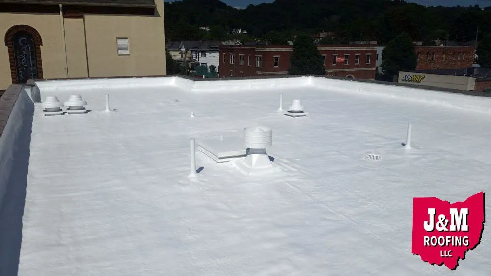 Local roof repair after storm damage in Mechanicstown, OH by J & M Roofing