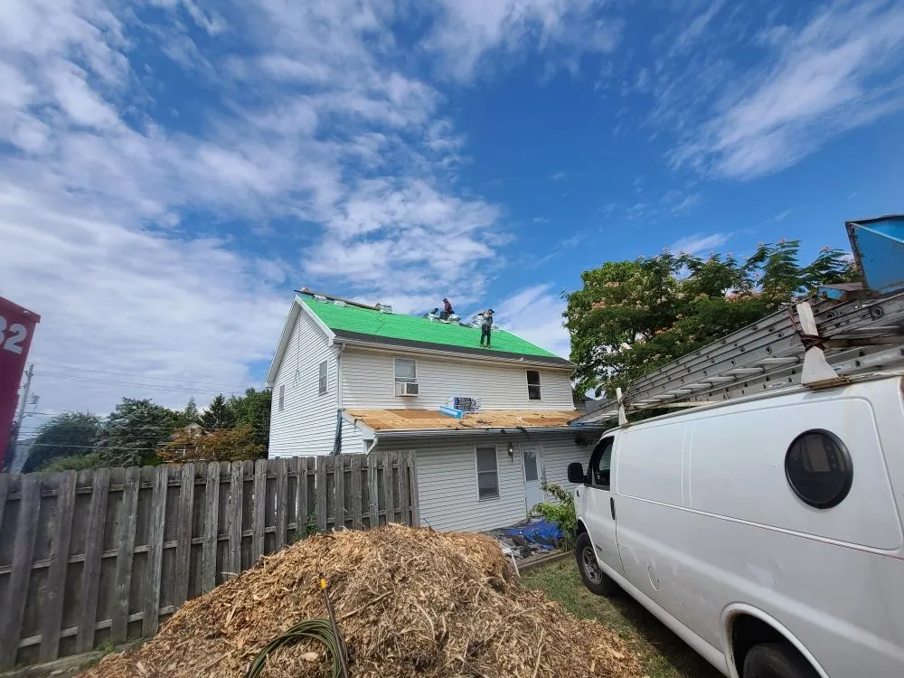 Slide of J & M Roofing