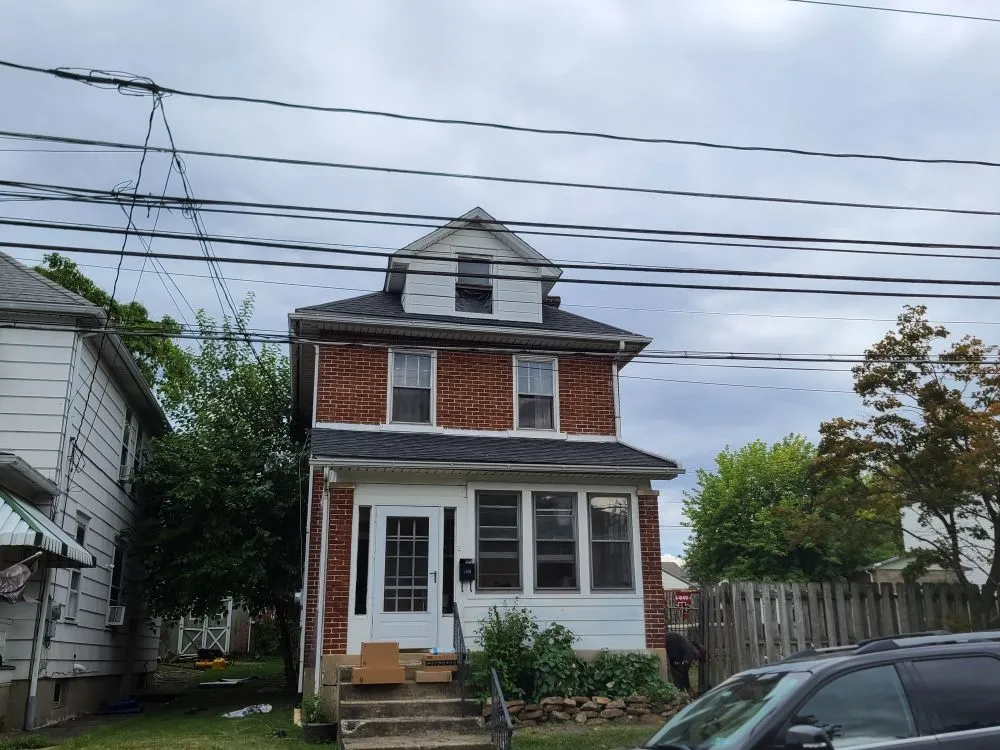 Slide of J & M Roofing