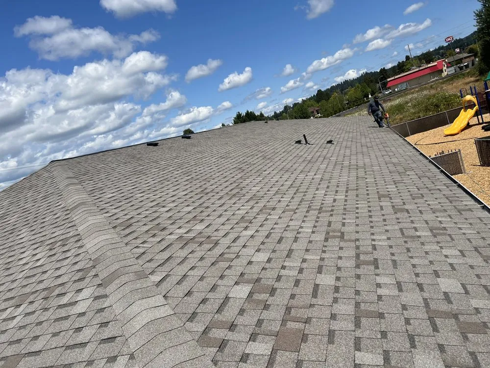 Slide of J & Sons Roofing