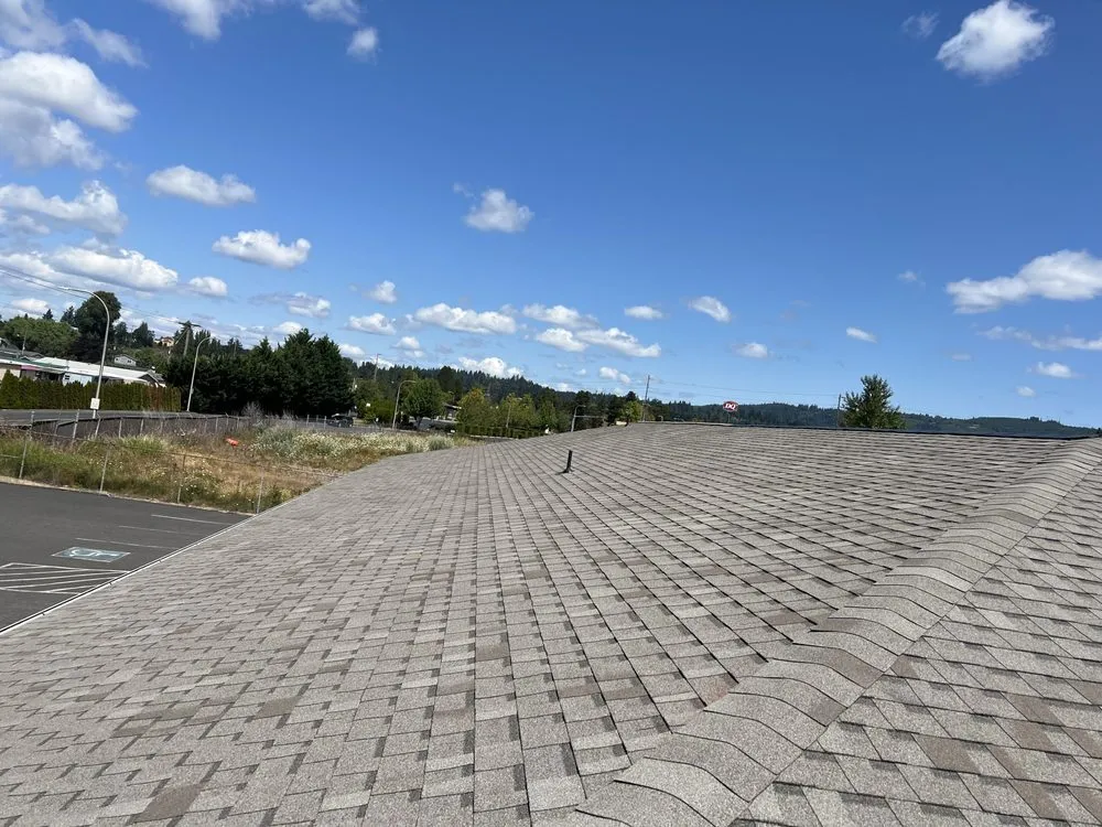 Slide of J & Sons Roofing