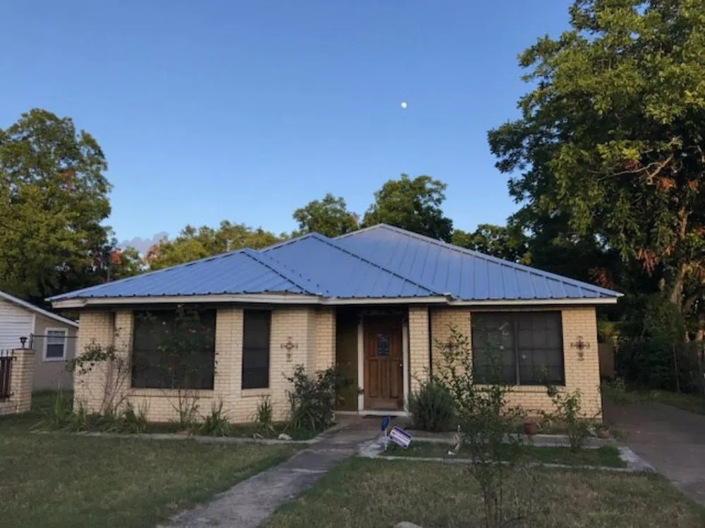 Slide of J & T Roofing Services