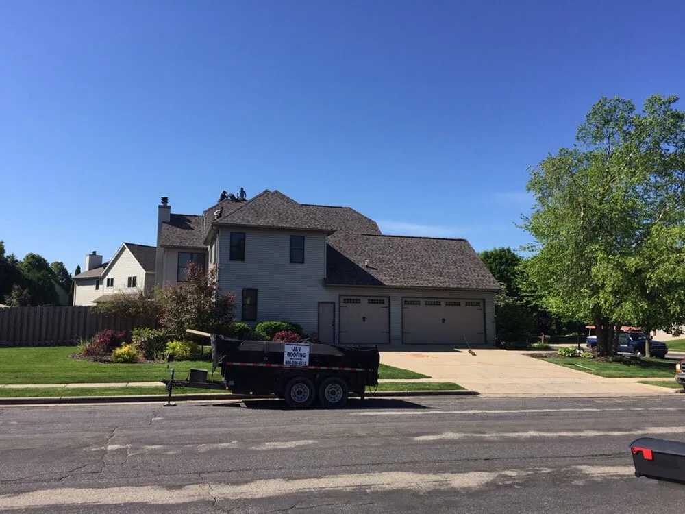 Slide of J & V Roofing