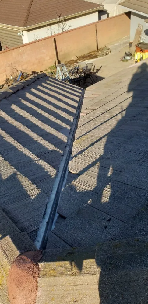 Slide of J 1 Pro Roofing