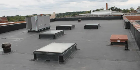 Slide of J Adams Roofing