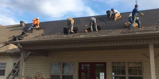 Slide of J Adams Roofing