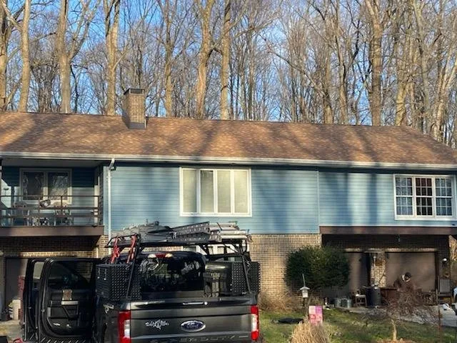 Slide of J and C Home Exteriors