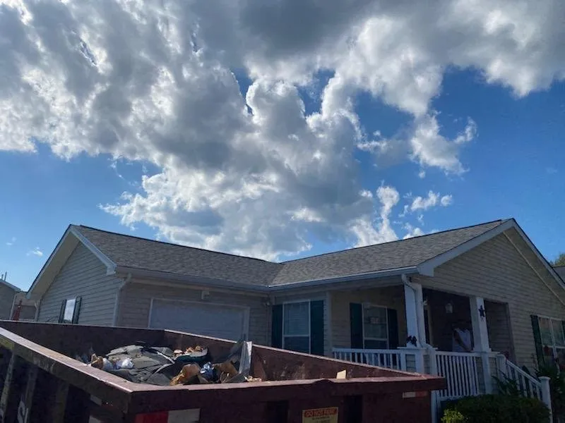 Slide of J and C Home Exteriors