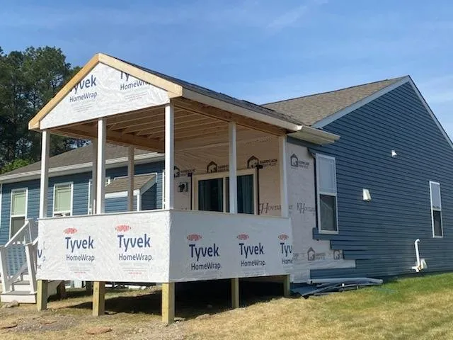 Slide of J and C Home Exteriors