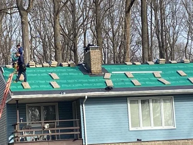 Slide of J and C Home Exteriors