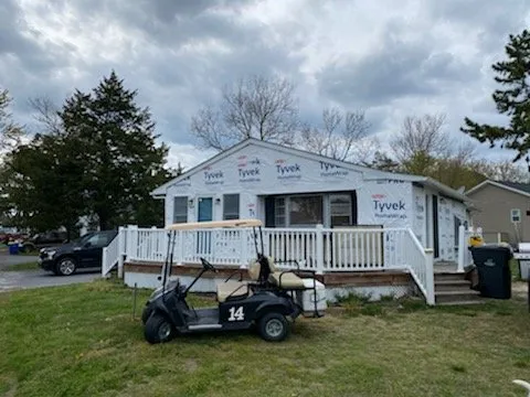 Slide of J and C Home Exteriors