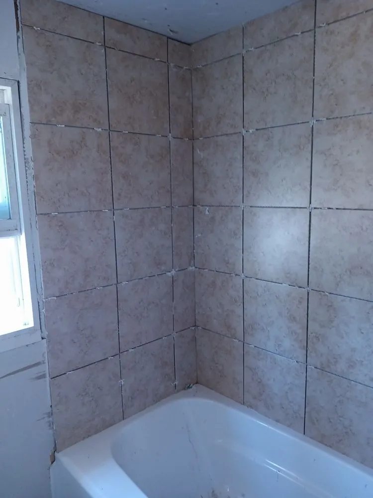 Slide of J AND G ROOFING