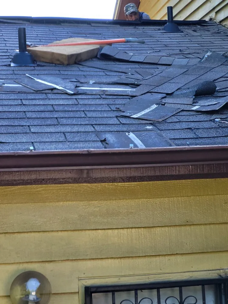 Slide of J AND G ROOFING