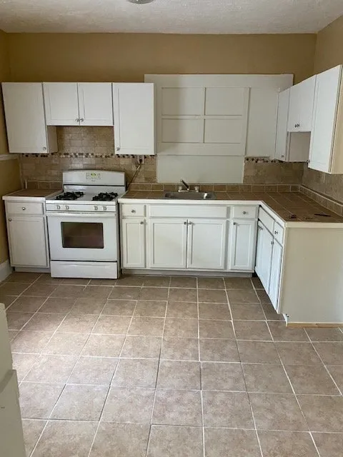 Slide of J AND G ROOFING