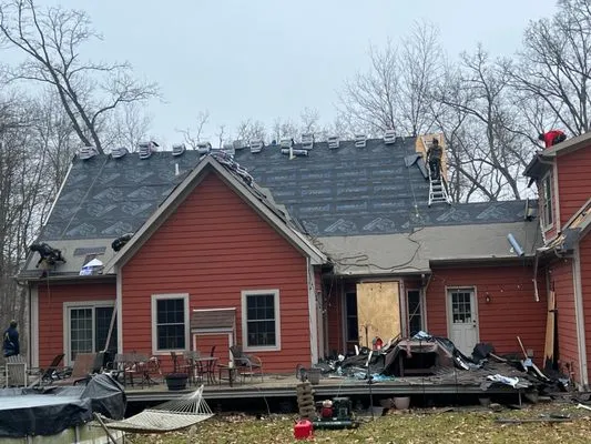 J and T Construction Services Logo