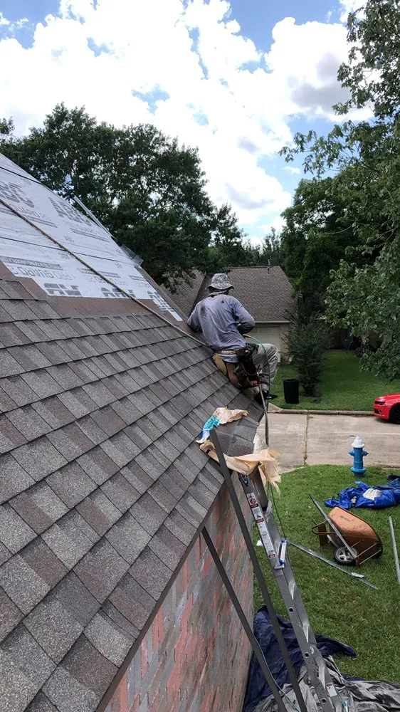 Slide of J C Roofing